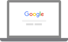 The Google search page on a laptop.
